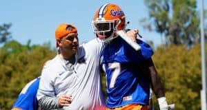University of Florida receivers coach Billy Gonzales walks with his arm around Kadarius Toney during spring football camp- Florida Gators football- 1280x853