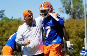 University of Florida receivers coach Billy Gonzales walks with his arm around Kadarius Toney during spring football camp- Florida Gators football- 1280x853