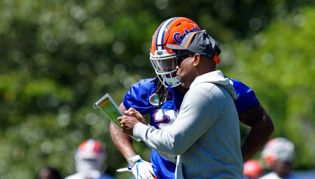 University of Florida running backs coach Greg Knox goes over a play with Jordan Scarlett during the Florida Gators second spring practice- Florida Gators football- 1280x853