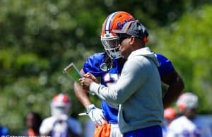 University of Florida running backs coach Greg Knox goes over a play with Jordan Scarlett during the Florida Gators second spring practice- Florida Gators football- 1280x853