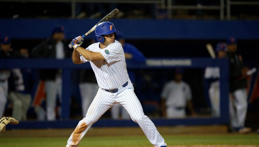 University of Florida center fielder Nick Horvath approaches a pitch in a win over the Florida State Seminoles- Florida Gators baseball- 1280x853