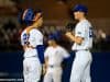 University of Florida pitcher Jack Leftwich and catcher JJ Schwarz meet at the mound in a win over the Florida State Seminoles- Florida Gators baseball- 1280x853