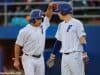 University of Florida seniors Nick Horvath and JJ Schwarz celebrate after Horvath scored a run- Florida Gators baseball- 1280x853