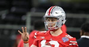 Dec 29, 2017; Arlington, TX, USA; Ohio State Buckeyes quarterback Joe Burrow (10) throws prior to the game against the Southern California Trojans in the 2017 Cotton Bowl at AT&T Stadium. Mandatory Credit: Matthew Emmons-USA TODAY Sports