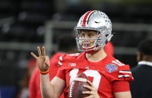 Dec 29, 2017; Arlington, TX, USA; Ohio State Buckeyes quarterback Joe Burrow (10) throws prior to the game against the Southern California Trojans in the 2017 Cotton Bowl at AT&T Stadium. Mandatory Credit: Matthew Emmons-USA TODAY Sports