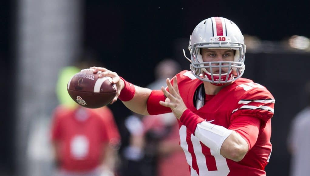 Oct 1, 2016; Columbus, OH, USA; Ohio State Buckeyes quarterback Joe Burrow (10) looks for an open receiver during the third quarter against the Rutgers Scarlet Knights at Ohio Stadium. Ohio State won the game 58-0. Mandatory Credit: Greg Bartram-USA TODAY Sports