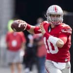 Oct 1, 2016; Columbus, OH, USA; Ohio State Buckeyes quarterback Joe Burrow (10) looks for an open receiver during the third quarter against the Rutgers Scarlet Knights at Ohio Stadium. Ohio State won the game 58-0. Mandatory Credit: Greg Bartram-USA TODAY Sports