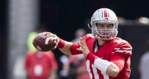 Oct 1, 2016; Columbus, OH, USA; Ohio State Buckeyes quarterback Joe Burrow (10) looks for an open receiver during the third quarter against the Rutgers Scarlet Knights at Ohio Stadium. Ohio State won the game 58-0. Mandatory Credit: Greg Bartram-USA TODAY Sports