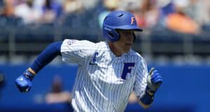 University of Florida catcher JJ Schwarz runs to first base during a win over the Florida State Seminoles- Florida Gators baseball- 1280x853