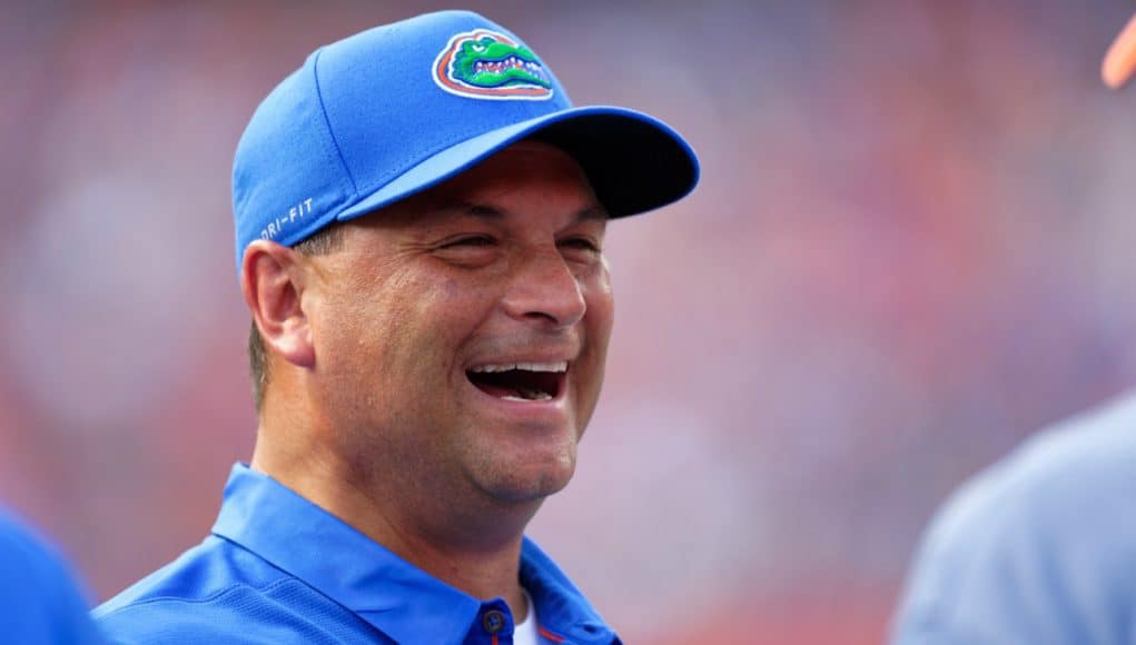 University of Florida co-offensive coordinator Billy Gonzales laughing on the field prior to the Florida Gators 2018 spring game- Florida Gators football- 1280x853