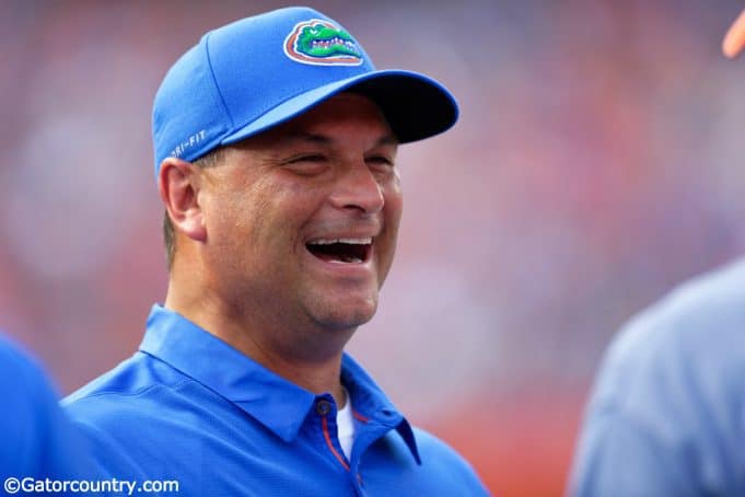 University of Florida co-offensive coordinator Billy Gonzales laughing on the field prior to the Florida Gators 2018 spring game- Florida Gators football- 1280x853