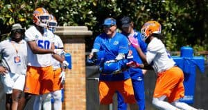 University of Florida defensive coordinator Todd Grantham goes through drills with the Gators defensive ends during spring camp- Florida Gators football- 1820x853