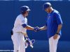 University of Florida infielder Blake Reese shakes Lars Davis’ hand after a single against Auburn- Florida Gators baseball- 1280x853