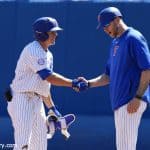 University of Florida infielder Blake Reese shakes Lars Davis’ hand after a single against Auburn- Florida Gators baseball- 1280x853