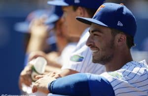 University of Florida third baseman Jonathan India smiles in the dugout during a series clinching win over Auburn- Florida Gators baseball- 1280x853