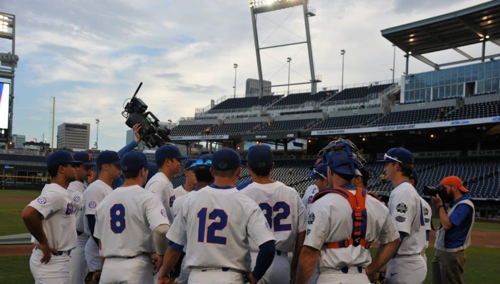 The Florida Gators huddle up before taking infield/outfield leading into their 2018 College World Series matchup with Texas Tech- Florida Gators baseball- 1280x850