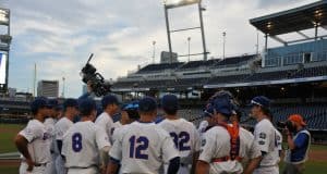 The Florida Gators huddle up before taking infield/outfield leading into their 2018 College World Series matchup with Texas Tech- Florida Gators baseball- 1280x850