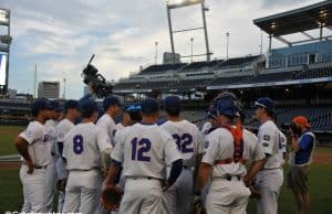 The Florida Gators huddle up before taking infield/outfield leading into their 2018 College World Series matchup with Texas Tech- Florida Gators baseball- 1280x850