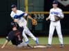 Jun 17, 2018; Omaha, NE, USA; Texas Tech Red Raiders center fielder Cody Farhat (1) slides into second base as Florida Gators second baseman Blake Reese (12) completes a double play with shortstop Deacon Liput (8) watching in the third inning during the College World Series at TD Ameritrade Park. Mandatory Credit: Steven Branscombe-USA TODAY Sports
