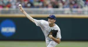 Jun 21, 2018; Omaha, NE, USA; Florida Gators pitcher Jack Leftwich (23) throws against the Texas Tech Red Raiders in the first inning in the College World Series at TD Ameritrade Park. Mandatory Credit: Bruce Thorson-USA TODAY Sports