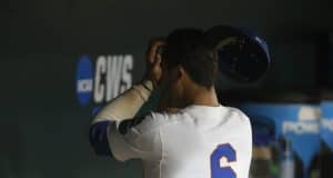 Jun 22, 2018; Omaha, NE, USA; Florida Gators third baseman Jonathan India (6) wipes his face after losing to the Arkansas Razorbacks in the College World Series at TD Ameritrade Park. Mandatory Credit: Bruce Thorson-USA TODAY Sports