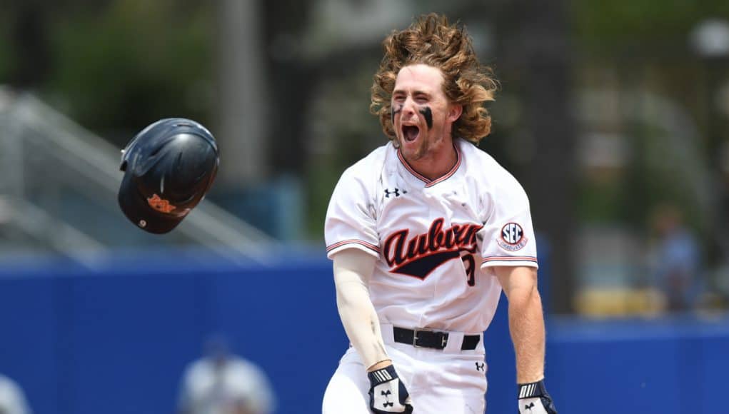 University of Auburn second baseman Luke Jarvis celebrates after his walk off single to beat the Florida Gators in the Gainesville Super Regional- Florida Gators baseball-1280x851