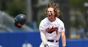 University of Auburn second baseman Luke Jarvis celebrates after his walk off single to beat the Florida Gators in the Gainesville Super Regional- Florida Gators baseball-1280x851