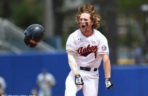 University of Auburn second baseman Luke Jarvis celebrates after his walk off single to beat the Florida Gators in the Gainesville Super Regional- Florida Gators baseball-1280x851