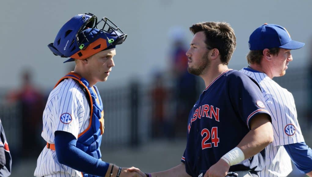 University of Florida catcher JJ Schwarz shakes hands with Auburn outfielder Conor Davis after the conclusion of the Gators and Tigers three-game series- Florida Gators baseball- 1280x853