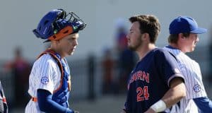 University of Florida catcher JJ Schwarz shakes hands with Auburn outfielder Conor Davis after the conclusion of the Gators and Tigers three-game series- Florida Gators baseball- 1280x853