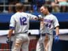 University of Florida outfielder Austin Langworthy is greeted by Blake Reese after Langworthy’s game tying home run in the Gainesville Super Regional- Florida Gators baseball- 1280x853