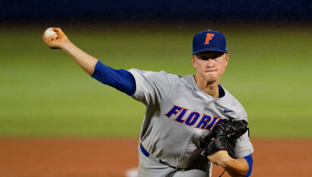 University of Florida pitcher Brady Singer throws against Jacksonville in the rain during the Gainesville Regional- Florida Gators baseball- 1280x853