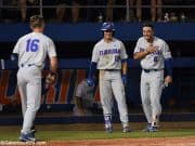 University of Florida third baseman Jonathan India and Blake Reese meet Wil Dalton at the plate after his home run against Jacksonville in the Gainesville Regional- Florida Gators baseball- 1280x853