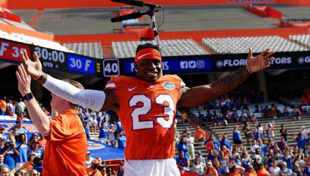 University of Florida defensive back Chauncey Gardner-Johnson celebrates with the band after the Orange and Blue Debut- Florida Gators football- 1280x853