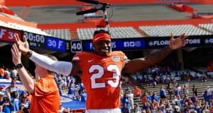 University of Florida defensive back Chauncey Gardner-Johnson celebrates with the band after the Orange and Blue Debut- Florida Gators football- 1280x853