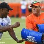 University of Florida defensive coordinator Todd Grantham goes through pass rushing drills with campers during Friday Night Lights- Florida Gators football- 1280x853