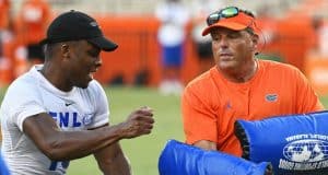 University of Florida defensive coordinator Todd Grantham goes through pass rushing drills with campers during Friday Night Lights- Florida Gators football- 1280x853