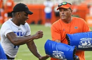 University of Florida defensive coordinator Todd Grantham goes through pass rushing drills with campers during Friday Night Lights- Florida Gators football- 1280x853
