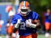 University of Florida freshman Iverson Clement carries the ball during a running backs drill in spring practice- Florida Gators football- 1280x854