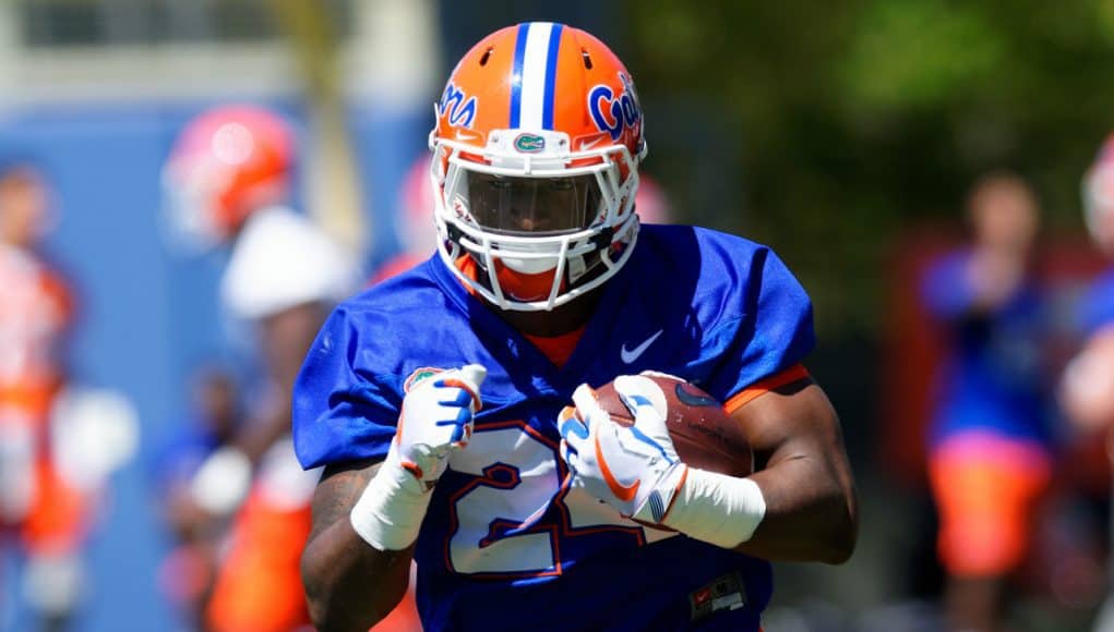 University of Florida freshman Iverson Clement carries the ball during a running backs drill in spring practice- Florida Gators football- 1280x854