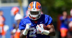 University of Florida freshman Iverson Clement carries the ball during a running backs drill in spring practice- Florida Gators football- 1280x854