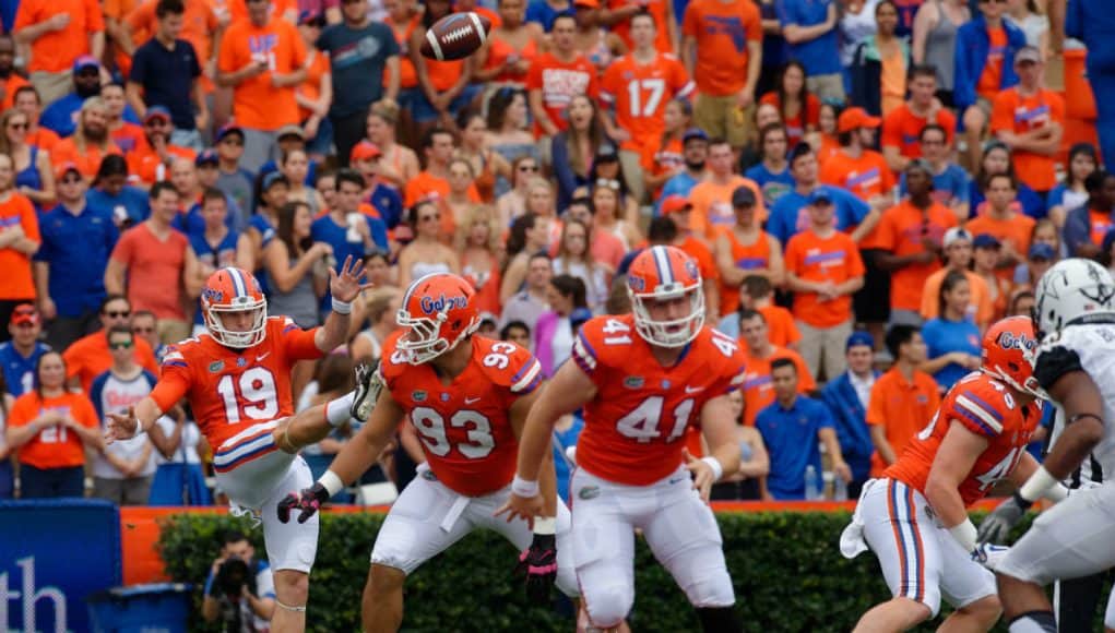 University of Florida long snapper Ryan Farr (41) runs down the field as Johnny Townsend punts during a win over Vanderbilt in 2017- Florida Gators football- 1280x852