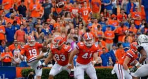 University of Florida long snapper Ryan Farr (41) runs down the field as Johnny Townsend punts during a win over Vanderbilt in 2017- Florida Gators football- 1280x852