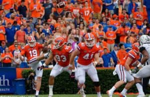 University of Florida long snapper Ryan Farr (41) runs down the field as Johnny Townsend punts during a win over Vanderbilt in 2017- Florida Gators football- 1280x852