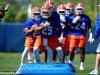 University of Florida running backs coach Greg Knox takes his players through a drill during spring football camp- Florida Gators football- 1280x853