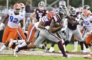 Florida Gators cornerback CJ McWilliams tackles the Mississippi State receiver- 1280x854