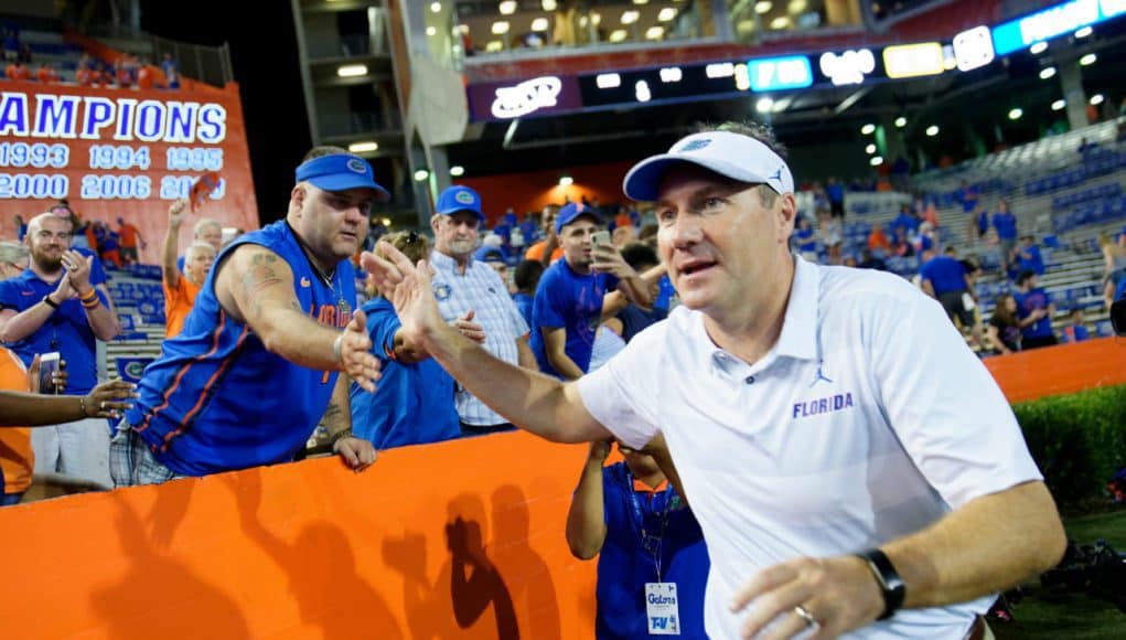 Florida Gators head coach Dan Mullen celebrates after his season debut win- 1280x852