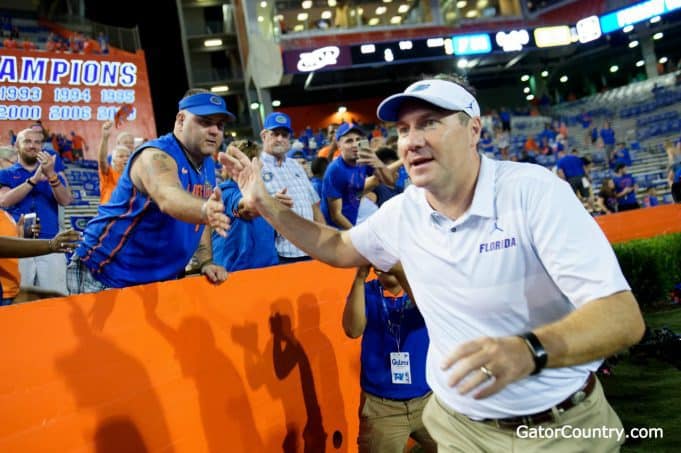 Florida Gators head coach Dan Mullen celebrates after his season debut win- 1280x852