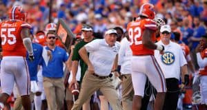 Florida Gators head coach Dan Mullen congratulates Jabari Zuniga on a sack- 1280x853