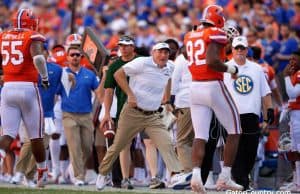 Florida Gators head coach Dan Mullen congratulates Jabari Zuniga on a sack- 1280x853